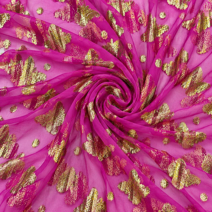 Pink lurexchiffon med gylne sommerfuglmotiver – stoffet formet som en spiral (bilde 1 av 3)