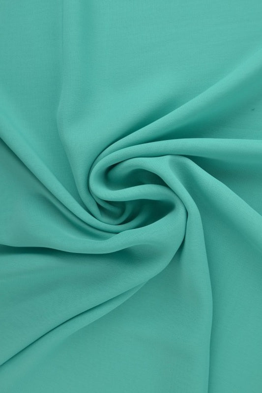 TURKIS CHIFFON – LETT, GJENNOMSIKTIG & MED FLOTT FALL
