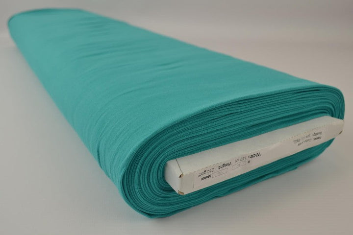 TURKIS BOMULLSJERSEYSTOFF – NATURLIG, PUSTENDE & ELASTISK