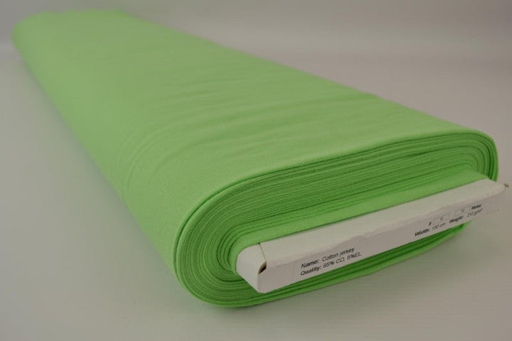 LIMEGRØNN BOMULLSJERSEYSTOFF – NATURLIG, PUSTENDE & ELASTISK