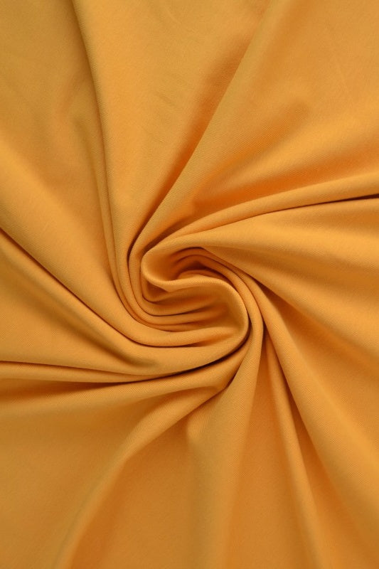 Karrigul bomullsjerseystoff – naturlig, pustende & elastisk (bilde 1 av 8)
