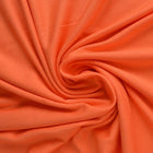 MØRKORANGE VISKOSE JERSEYSTOFF