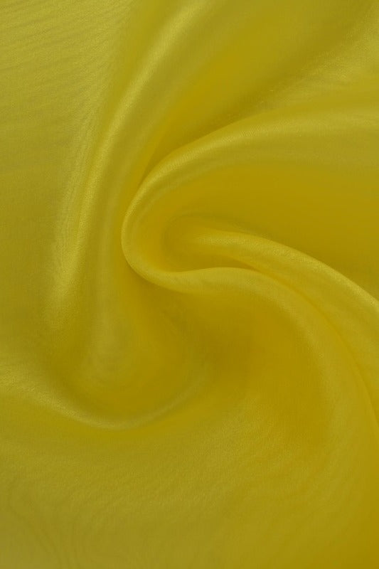 Gul organza stoff – transparent og skinnende (bilde 1 av 7)