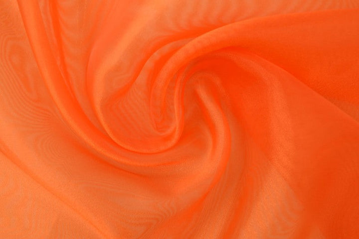 MØRKORANSJE ORGANZA STOFF – TRANSPARENT OG SKINNENDE