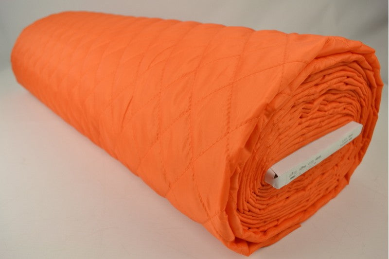 ORANGE QUILTET STOFF MED VATTERT BAKSIDE