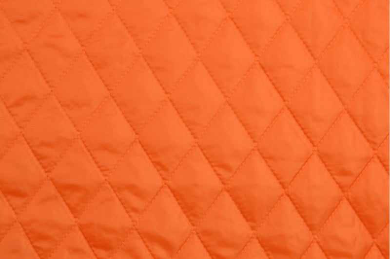 ORANGE QUILTET STOFF MED VATTERT BAKSIDE