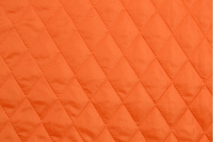 ORANGE QUILTET STOFF MED VATTERT BAKSIDE