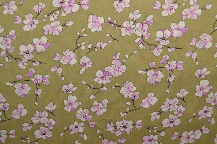 Viskosestoff med kirsebærblomst trykk – karri & hvit (bilde 3 av 9)